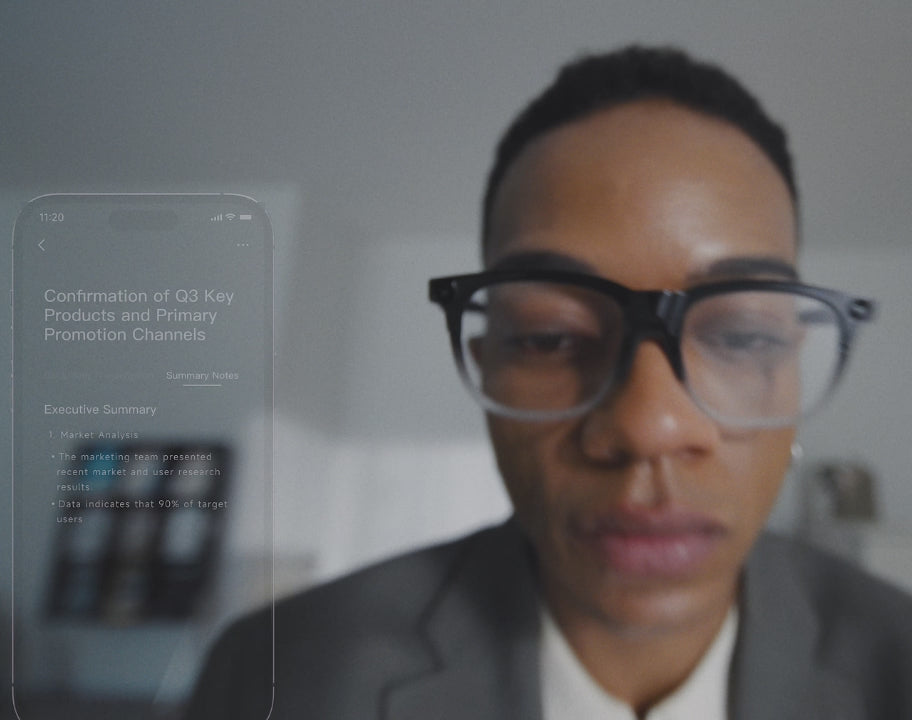 A person wearing INMO GO3 next to a phone screen showing a meeting title and an Executive Summary